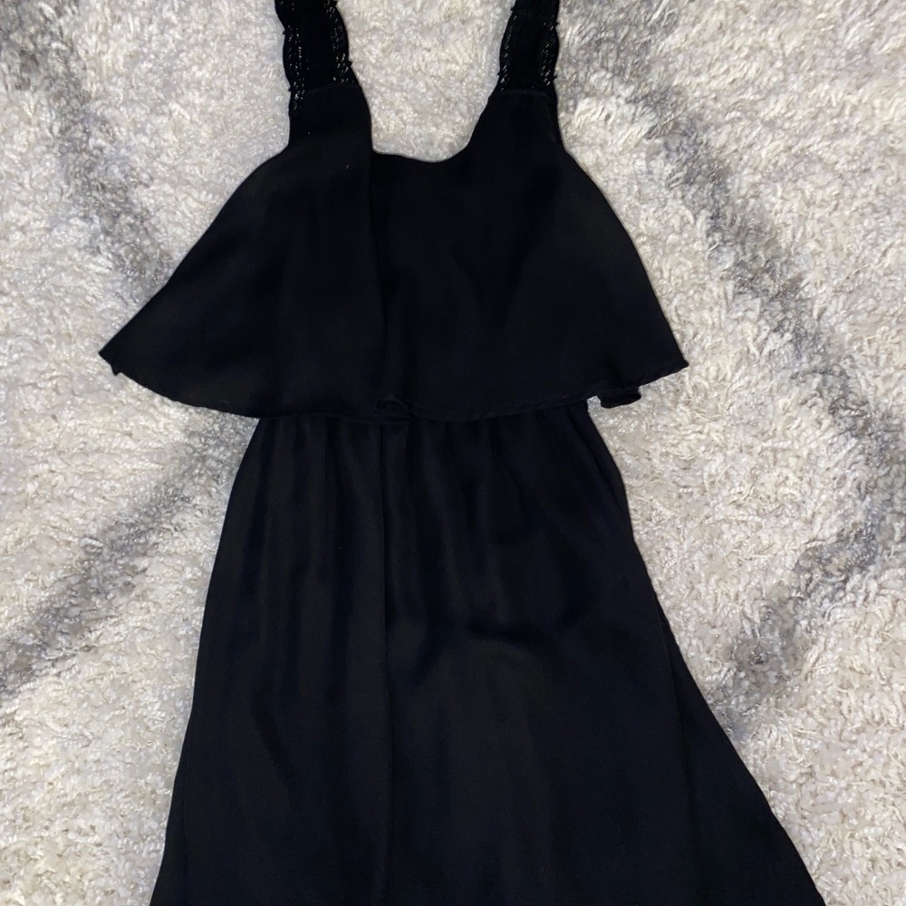 Short black dress with thick, braided straps. Forever 21. Size: small